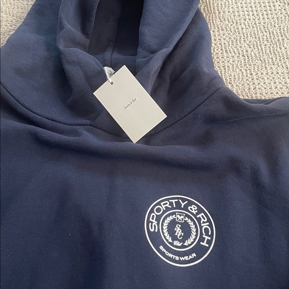 Sporty & Rich Dark Blue Hoodie XL NWT
All Cotton. - Picture 3 of 7